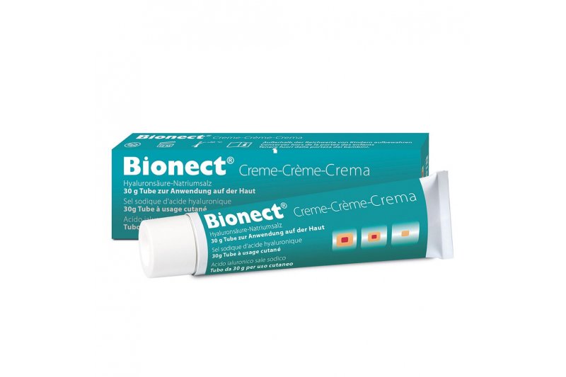 Bionect.jpg Bionect Creme in einem 30 g Tube, verpackt in einer turquoise-blauen Schachtel mit mehrsprachiger Beschreibung.